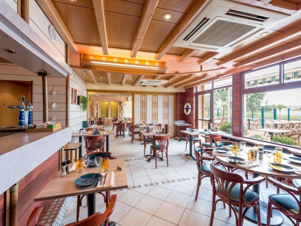 Logis Hotels - Au Poisson D'Argent - Hotel 3 Etoiles Et Restaurant Le Mesnil-en-Vallée المظهر الخارجي الصورة